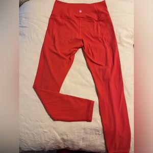 Athleta transcend stash tight with pockets